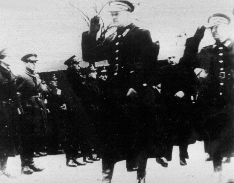 A commander of the Polish police in Warsaw, with Adam Czerniaikow, head of the Judenrat in the ghetto, reviewing a formation of Jewish police.