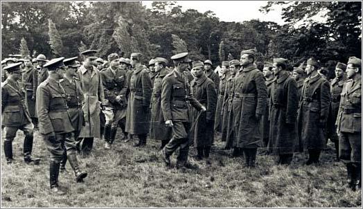 Czechoslovak soldiers being inspected by a British General Jan Kubis -1st row,to the left of the British General- and Josef Gabcik -1st row, to the Generals right-