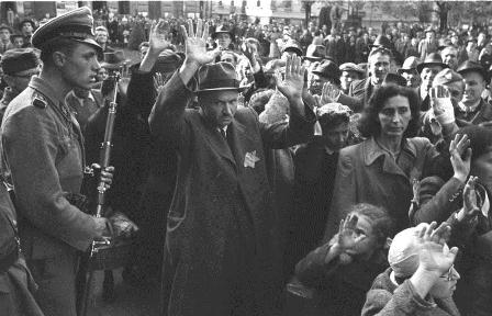 Hungarian and Nazi German soldiers round up Jews in Budapest, October 1944